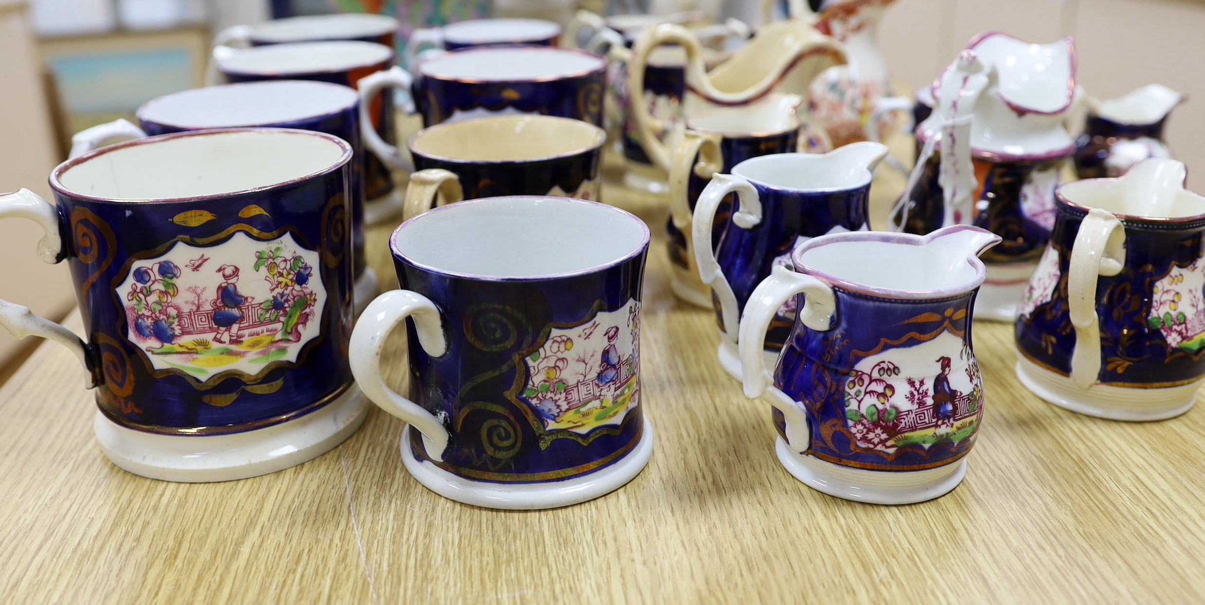 A quantity of Gaudy Welsh lustre jugs and mugs with chinoiserie motifs